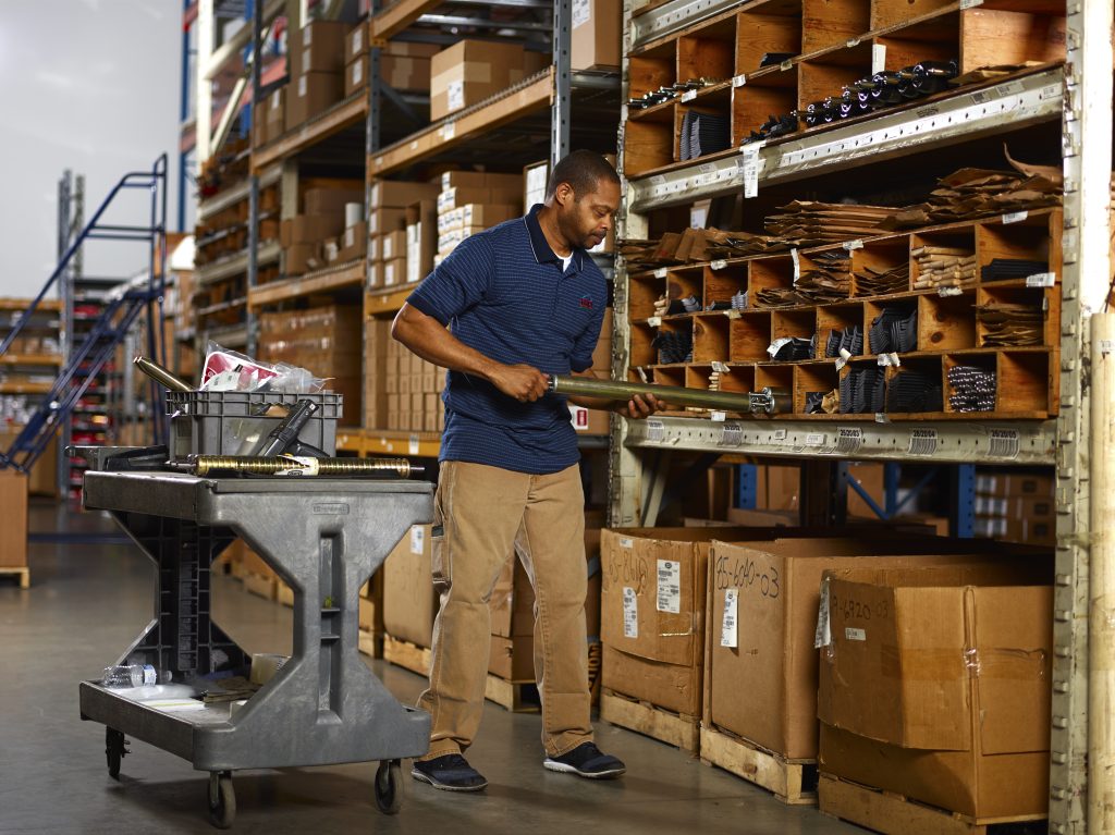 man stocking shelves