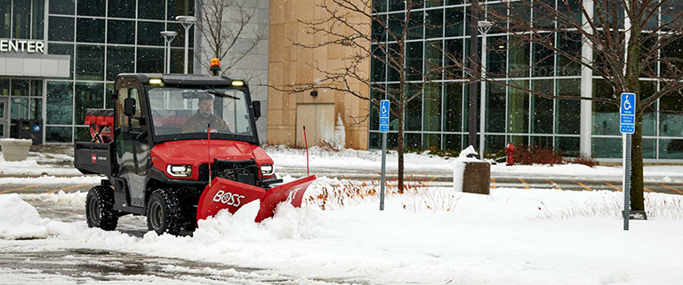 Toro Workman UTX - plowing snow